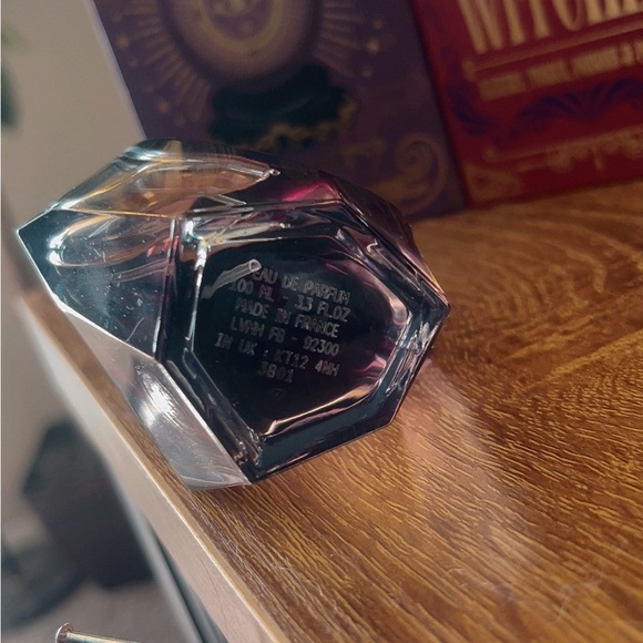 Givenchy Eau de Parfum Bottle with Silver Accents - Picture 1 of 5